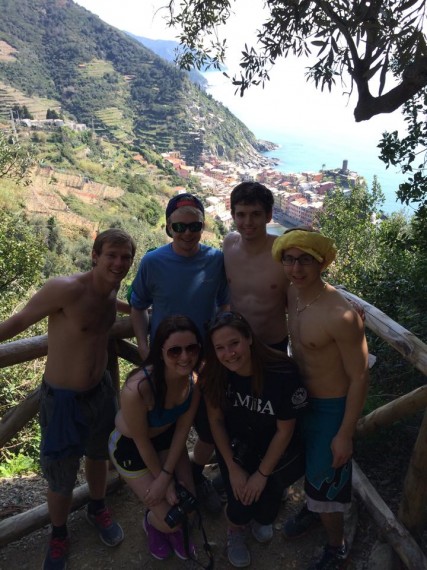 Hiking group in Cinque Terre with Vernazza in the background!